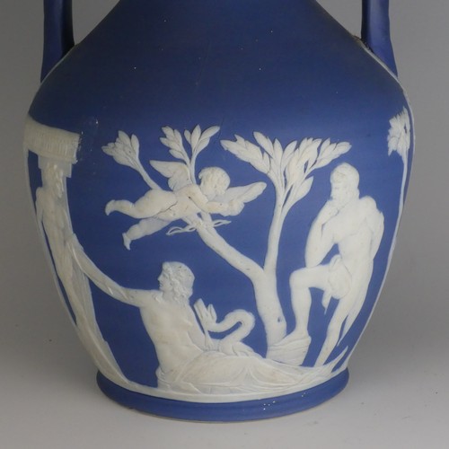 54 - A 19thC Wedgwood blue dip Jasperware Portland Vase, decorated in classical figures, of ovoid form wi... 