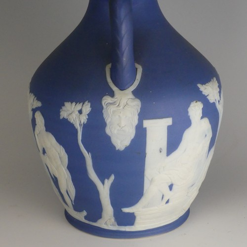 54 - A 19thC Wedgwood blue dip Jasperware Portland Vase, decorated in classical figures, of ovoid form wi... 