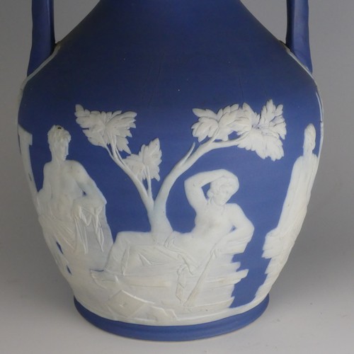 54 - A 19thC Wedgwood blue dip Jasperware Portland Vase, decorated in classical figures, of ovoid form wi... 