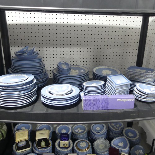 58 - A large quantity of Wedgwood Jasperwares, primarily in blue colourway, including Christmas Plates, C... 