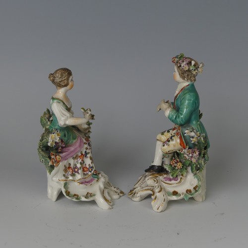 60 - A pair of 18thC English porcelain Figurines, possibly Derby, modelled as children, one holding flute... 