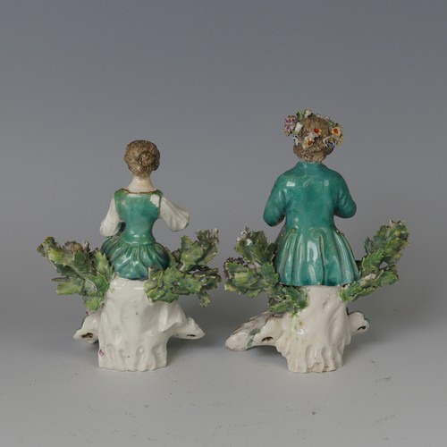 60 - A pair of 18thC English porcelain Figurines, possibly Derby, modelled as children, one holding flute... 