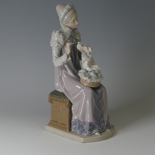 61 - A Lladro figure of a Medieval Lady, modelled seated doing embroidery, 5126, marks to base, H 29cm.... 