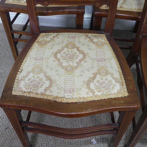 423 - A set of four Edwardian mahogany and inlaid Parlour Chairs, backrest inlaid with flowered urns, abov... 