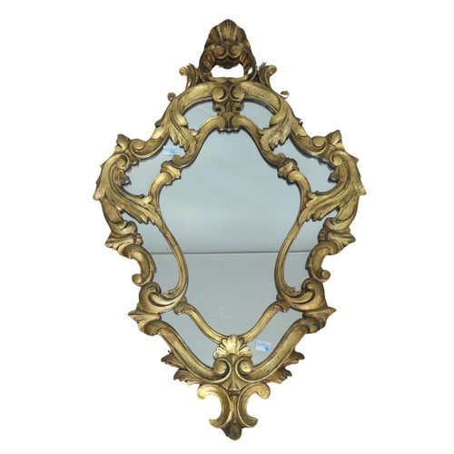 425 - An antique giltwood Rococo style wall Mirror, H 76.5 cm.