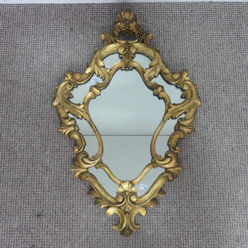 425 - An antique giltwood Rococo style wall Mirror, H 76.5 cm.