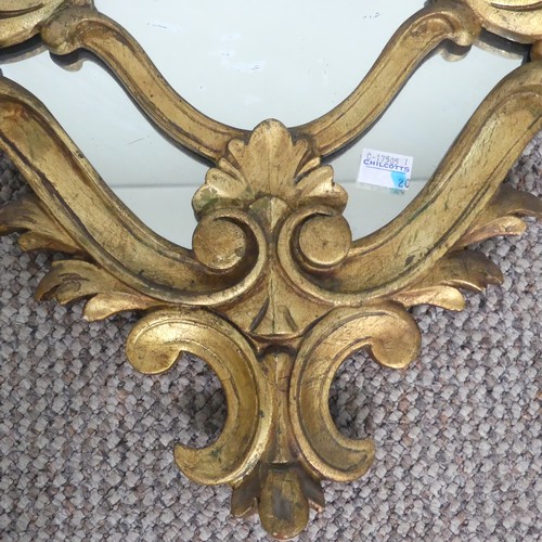 425 - An antique giltwood Rococo style wall Mirror, H 76.5 cm.