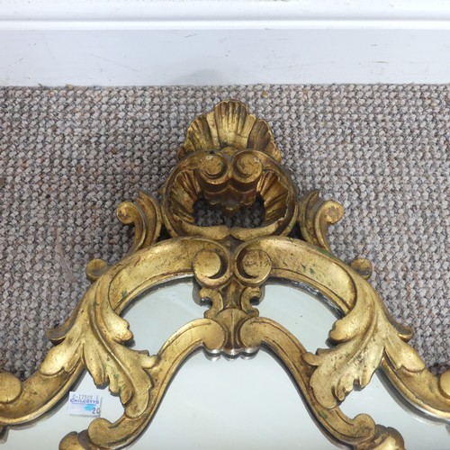 425 - An antique giltwood Rococo style wall Mirror, H 76.5 cm.