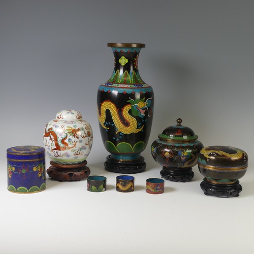 140 - A mid 20thC Chinese cloisonné baluster Vase, the black ground with yellow dragon and foliate decorat... 