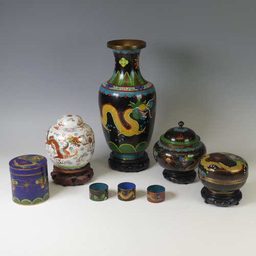 140 - A mid 20thC Chinese cloisonné baluster Vase, the black ground with yellow dragon and foliate decorat... 