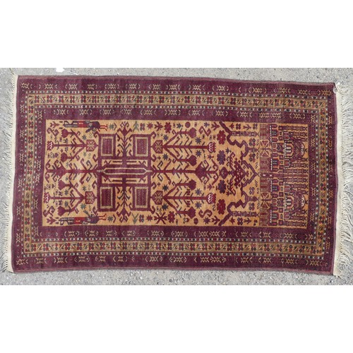 547 - Tribal Rugs; a hand-knotted Afghan War Rug in the form of a Prayer Rug, wool pile on wool base, the ... 