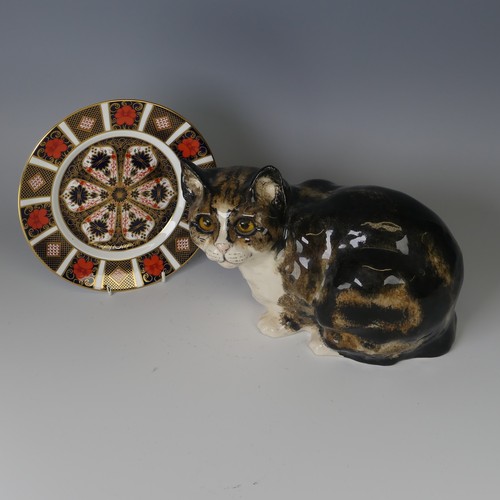 67 - A Jenny Winstanley studio pottery Cat, modelled in recumbent pose, pen marks to base, H 20cm togethe... 