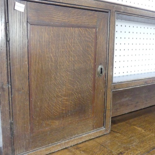 426 - A 19th century oak dresser Base, with associated plate rack, moulded cornice over pierced frieze and... 