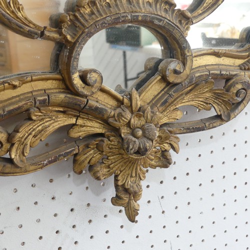 427 - An antique possibly 19th century ornate giltwood and gesso wall Mirror, note with some losses, W 59 ... 