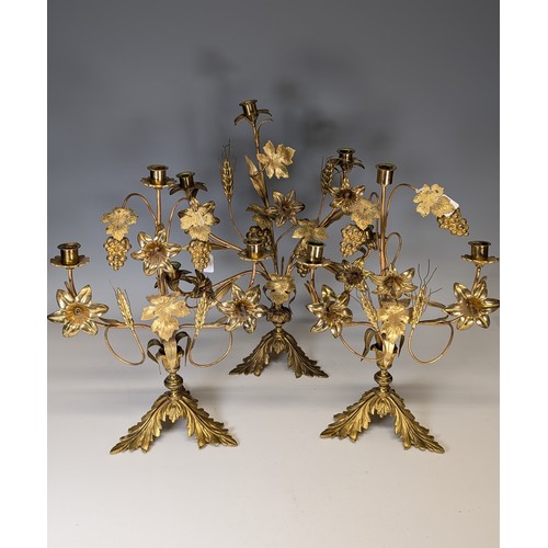 429 - An unusual set of three early 20th century gilt metal floral Candelabra, each with three candlestick... 