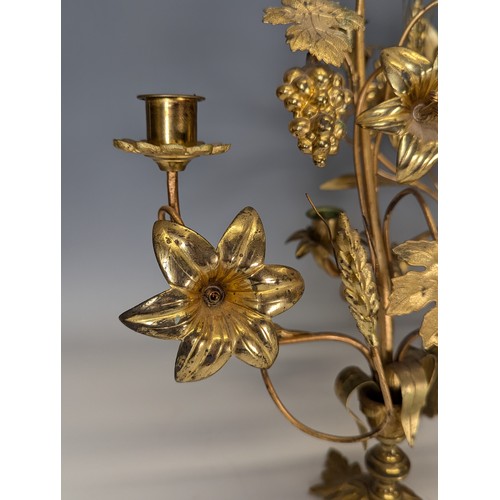 429 - An unusual set of three early 20th century gilt metal floral Candelabra, each with three candlestick... 