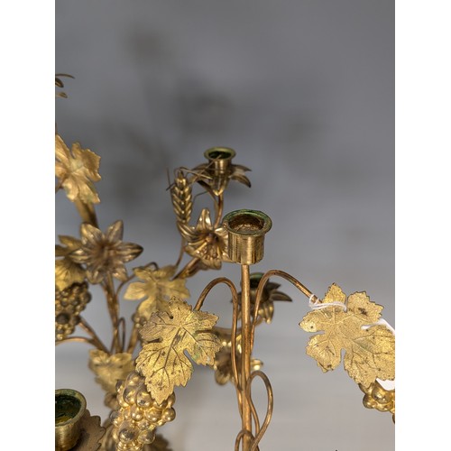 429 - An unusual set of three early 20th century gilt metal floral Candelabra, each with three candlestick... 