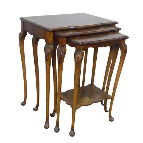 431 - A 20th century burr walnut nest of three Tables, by Simpsons of Silver Street, Halifax, (Largest) W ... 