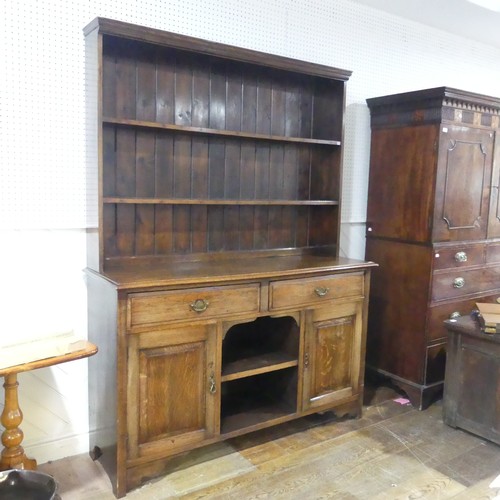 434 - An early 20th century oak Dresser, two shelves over base, W 152 cm x H 203 cm x D 49 cm.... 