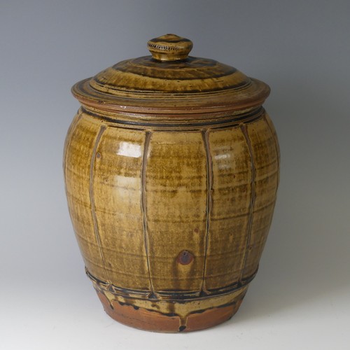 70 - Mike Dodd (b. 1943) a stoneware Storage Jar and Cover, of fluted form, with knop finial to cover, im... 