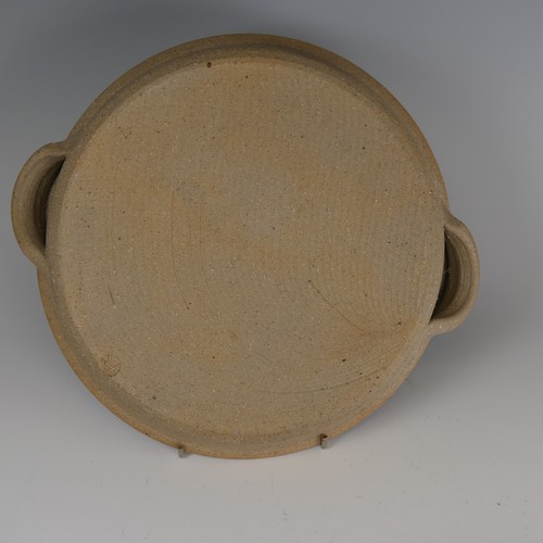 74 - Jim Malone (b. 1946) a studio pottery stoneware Bowl, covered in cream ash glaze with incised decora... 