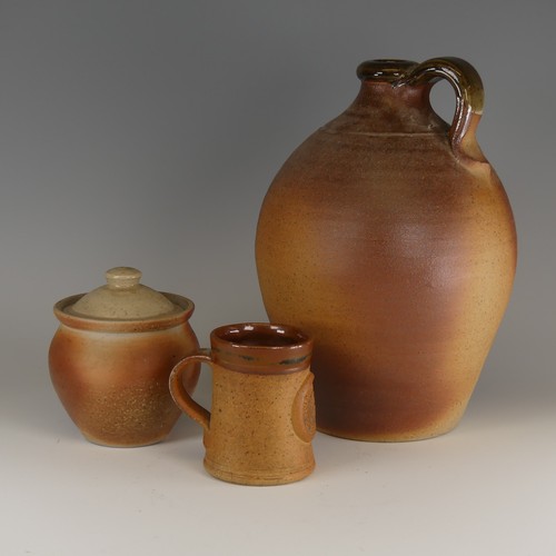 75 - John Leach for Muchelney pottery Flagon, of classic toasted colouration, with loop handle and glazed... 