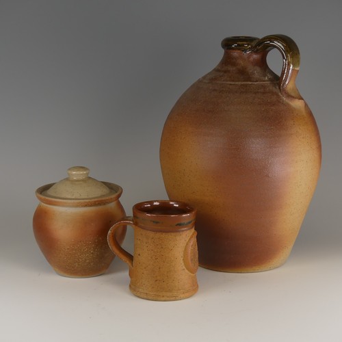 75 - John Leach for Muchelney pottery Flagon, of classic toasted colouration, with loop handle and glazed... 