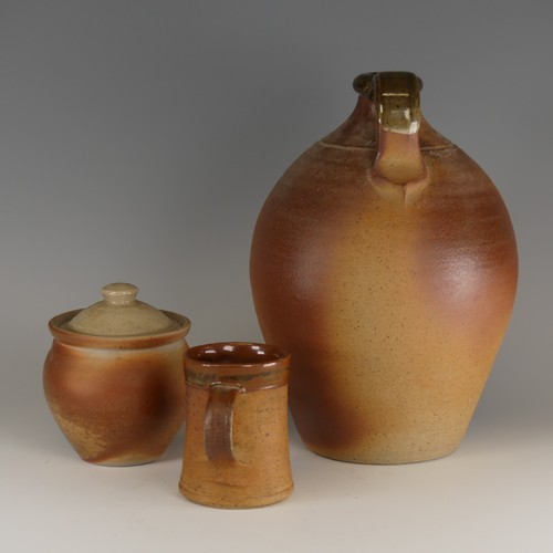 75 - John Leach for Muchelney pottery Flagon, of classic toasted colouration, with loop handle and glazed... 