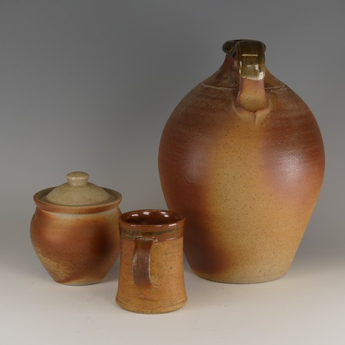 75 - John Leach for Muchelney pottery Flagon, of classic toasted colouration, with loop handle and glazed... 