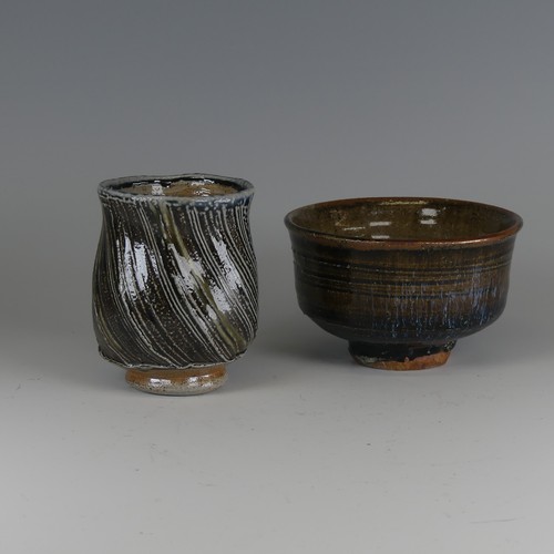 77 - Ruthanne Tudball (b. 1948) a studio pottery stoneware Yunomi, of spiralling fluted form, in green, b... 