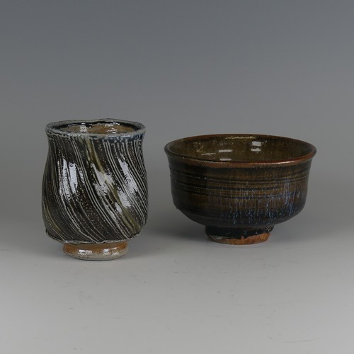 77 - Ruthanne Tudball (b. 1948) a studio pottery stoneware Yunomi, of spiralling fluted form, in green, b... 