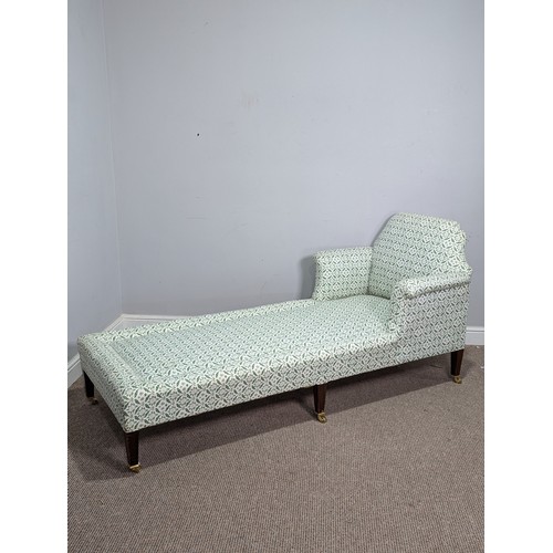 437 - A Howard and Sons mahogany upholstered Day Bed / Chaise Longue, raised on six tapering square legs a... 