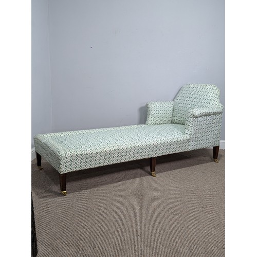 437 - A Howard and Sons mahogany upholstered Day Bed / Chaise Longue, raised on six tapering square legs a... 