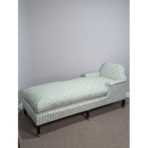 437 - A Howard and Sons mahogany upholstered Day Bed / Chaise Longue, raised on six tapering square legs a... 