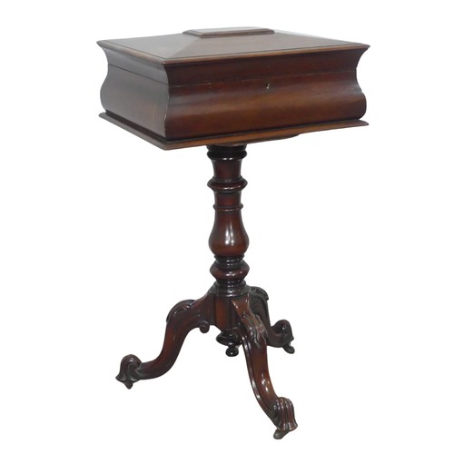 439 - A 19th century mahogany Teapoy, of sarcophagus form, hinged top concealing fitted interior, raised o... 