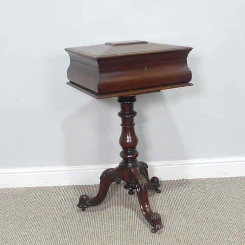 439 - A 19th century mahogany Teapoy, of sarcophagus form, hinged top concealing fitted interior, raised o... 