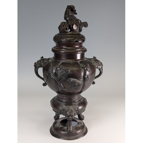 141 - A late 19th century Japanese bronze Censer, raised on three masked legs, with central pumpkin shaped... 