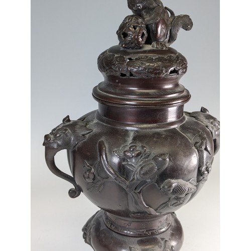 141 - A late 19th century Japanese bronze Censer, raised on three masked legs, with central pumpkin shaped... 