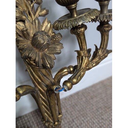 444 - A pair of antique gilt metal three-branch wall Lights / Sconces, with ribbon pediments, note one wit... 