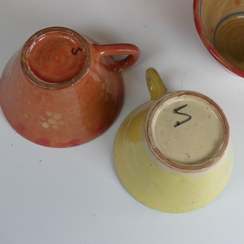 89 - Michael Emmett (b. 1945) a set of six studio pottery Plates, painted in pink slip and further decora... 