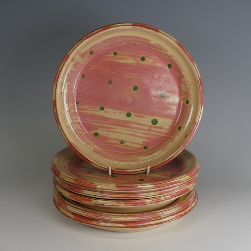 89 - Michael Emmett (b. 1945) a set of six studio pottery Plates, painted in pink slip and further decora... 