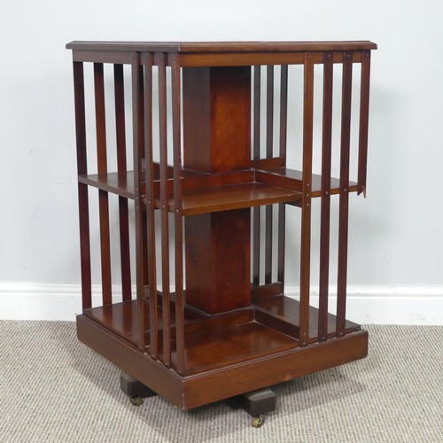 451 - An Edwardian mahogany revolving Bookcase, note one of the spindles is damaged, W 48.5 cm x H 78 cm x... 