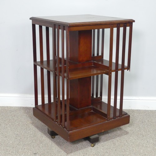 451 - An Edwardian mahogany revolving Bookcase, note one of the spindles is damaged, W 48.5 cm x H 78 cm x... 