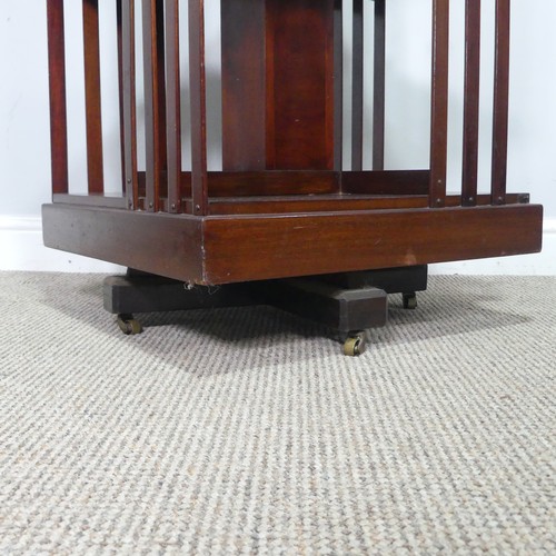 451 - An Edwardian mahogany revolving Bookcase, note one of the spindles is damaged, W 48.5 cm x H 78 cm x... 