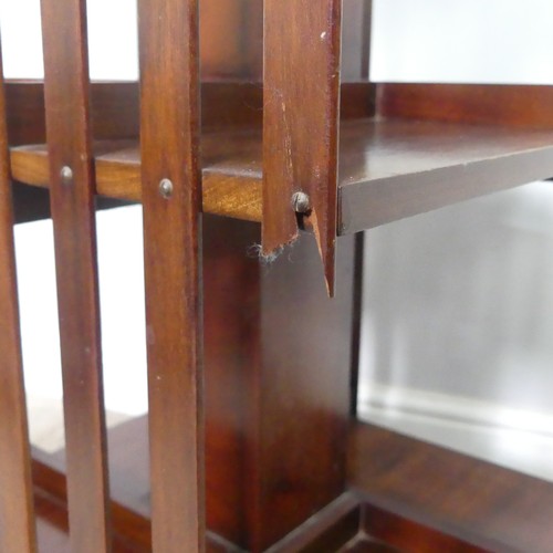 451 - An Edwardian mahogany revolving Bookcase, note one of the spindles is damaged, W 48.5 cm x H 78 cm x... 