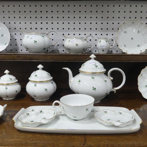 92 - An Augarten Wien/Viennese porcelain Tea Set, comprising nine Teacups and Saucers, seven Plates, Teap... 