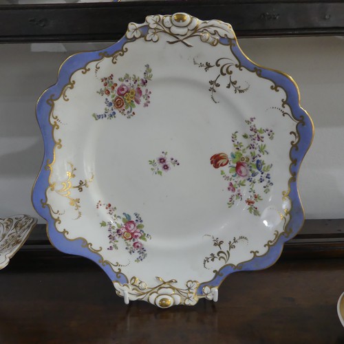 95 - A John Ridgeway porcelain part Tea Service, painted with floral sprays within gilt and blue border, ... 