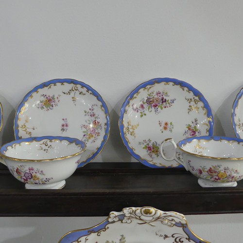 95 - A John Ridgeway porcelain part Tea Service, painted with floral sprays within gilt and blue border, ... 