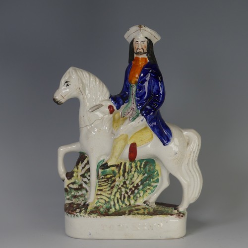 96 - An antique Staffordshire porcelain Figure of a seated Cat, decorated with sponged striped coat, with... 