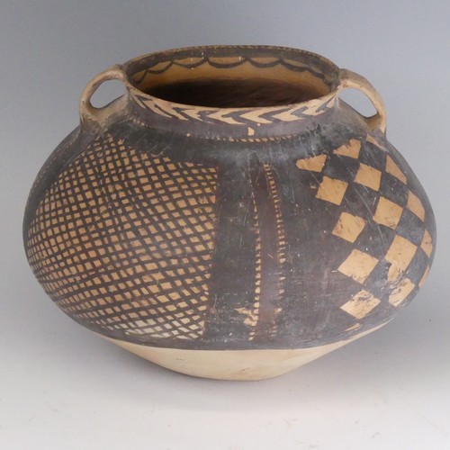 160 - A Chinese earthenware funerary Pot, possibly c. 2000 BC, the ovoid body decorated in black lattice w... 